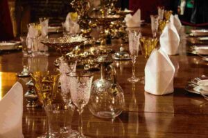 glassware and dishes on a table at a restaurant
