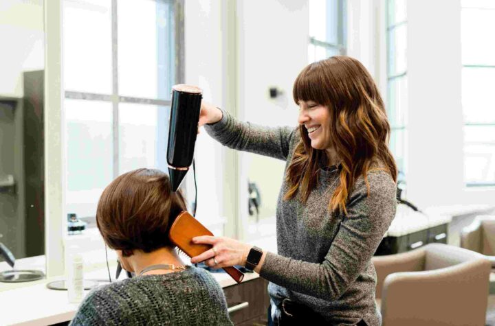 woman getting hair done at a hair salon
